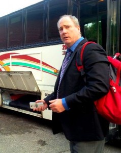 Peter Crosby, coach of the Guelph Hurricanes, arrives in Stratford for Friday's hockey game against the Cullitons. He questions how his rival and the league handled a rape scandal.